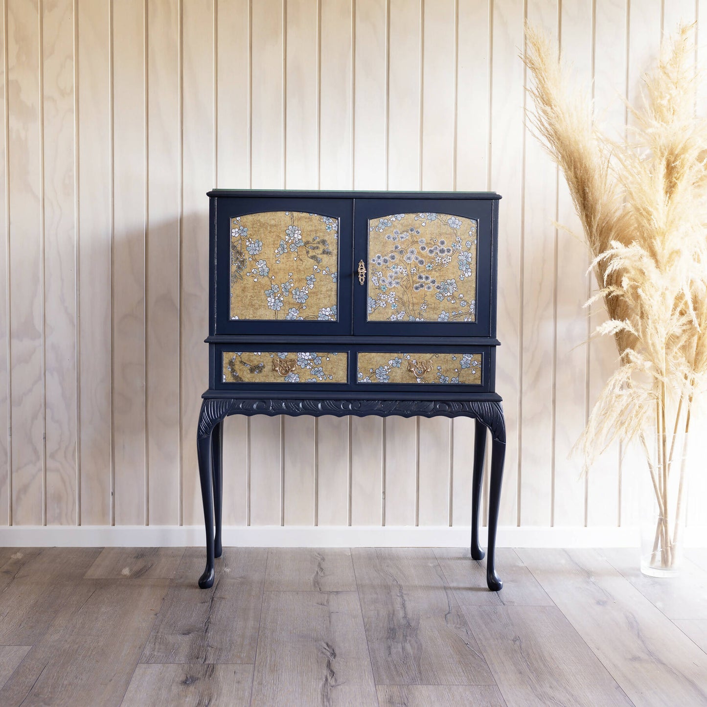 Exceptional vintage cocktail cabinet in midnight blue, boasting an oriental-inspired design. Sold, commission available.