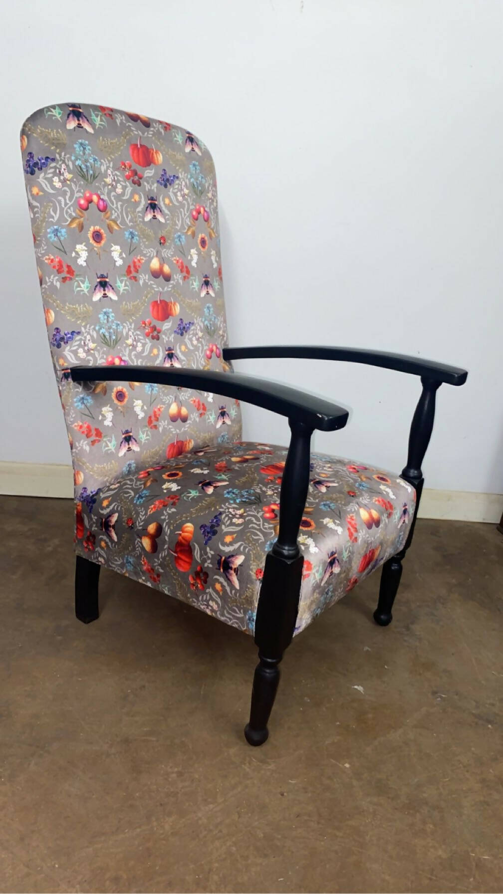 Reupholstered 1940s open armchair