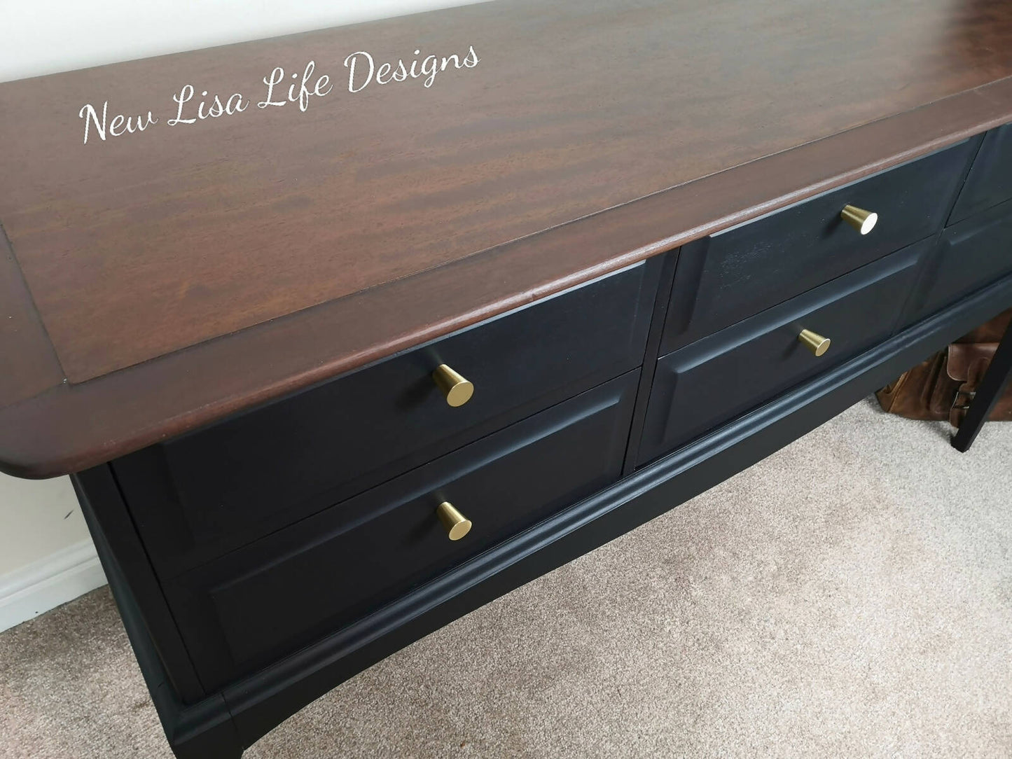 Stag Minstrel 6 drawer console table. Black with stripped & restored top with dark stain.