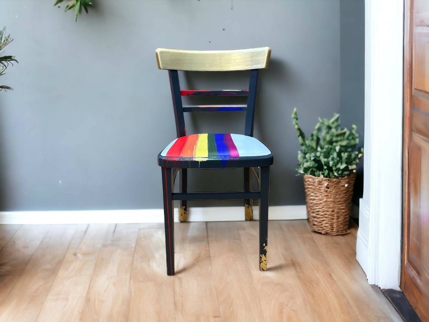 This item is SOLD! Hand painted retro teak school chair with vibrant rainbow stripe seat and gold leaf backrest. Abstract art design.