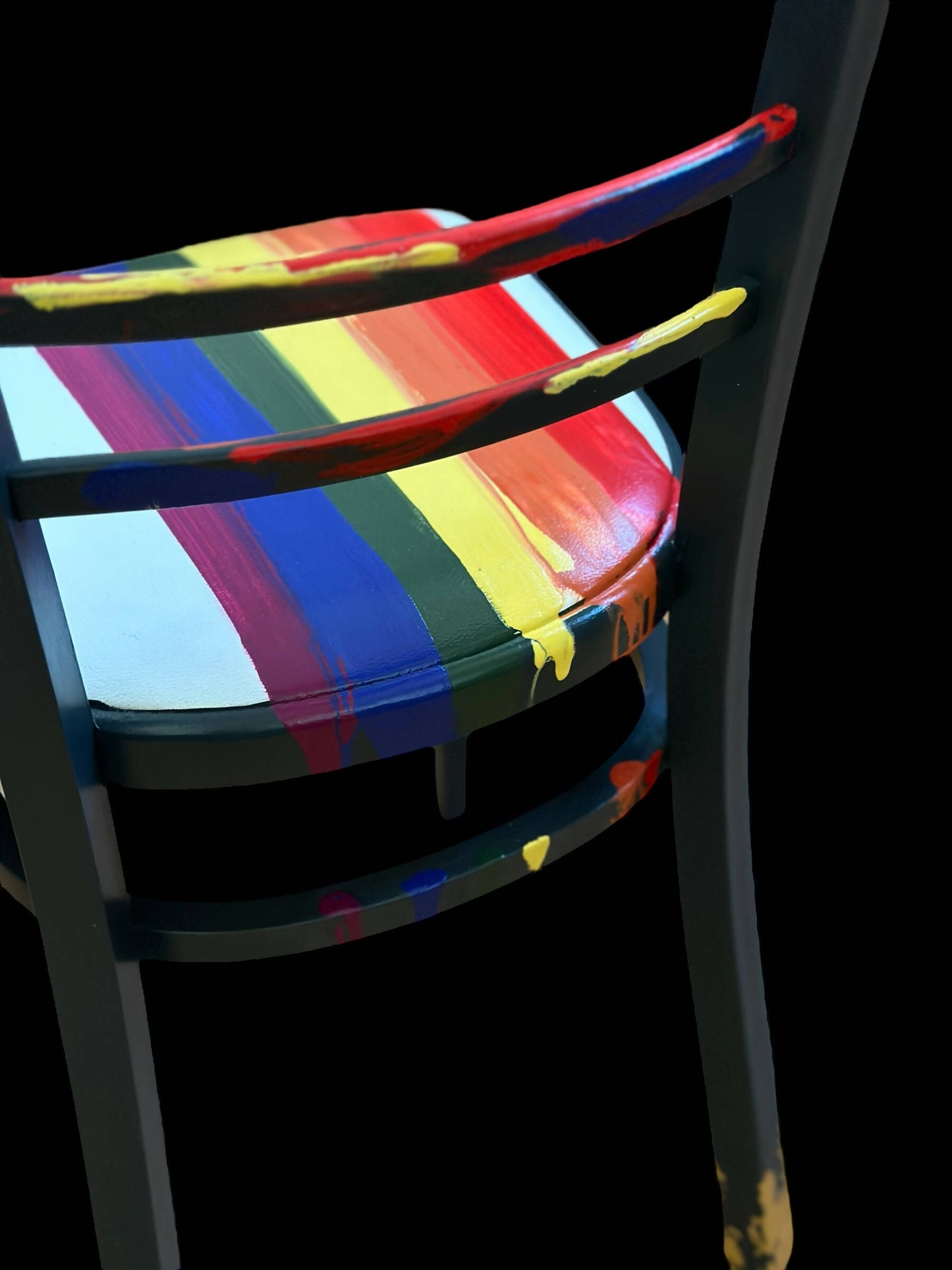 Hand painted school chair with vibrant rainbow stripe seat and gold leaf backrest. Abstract art design.