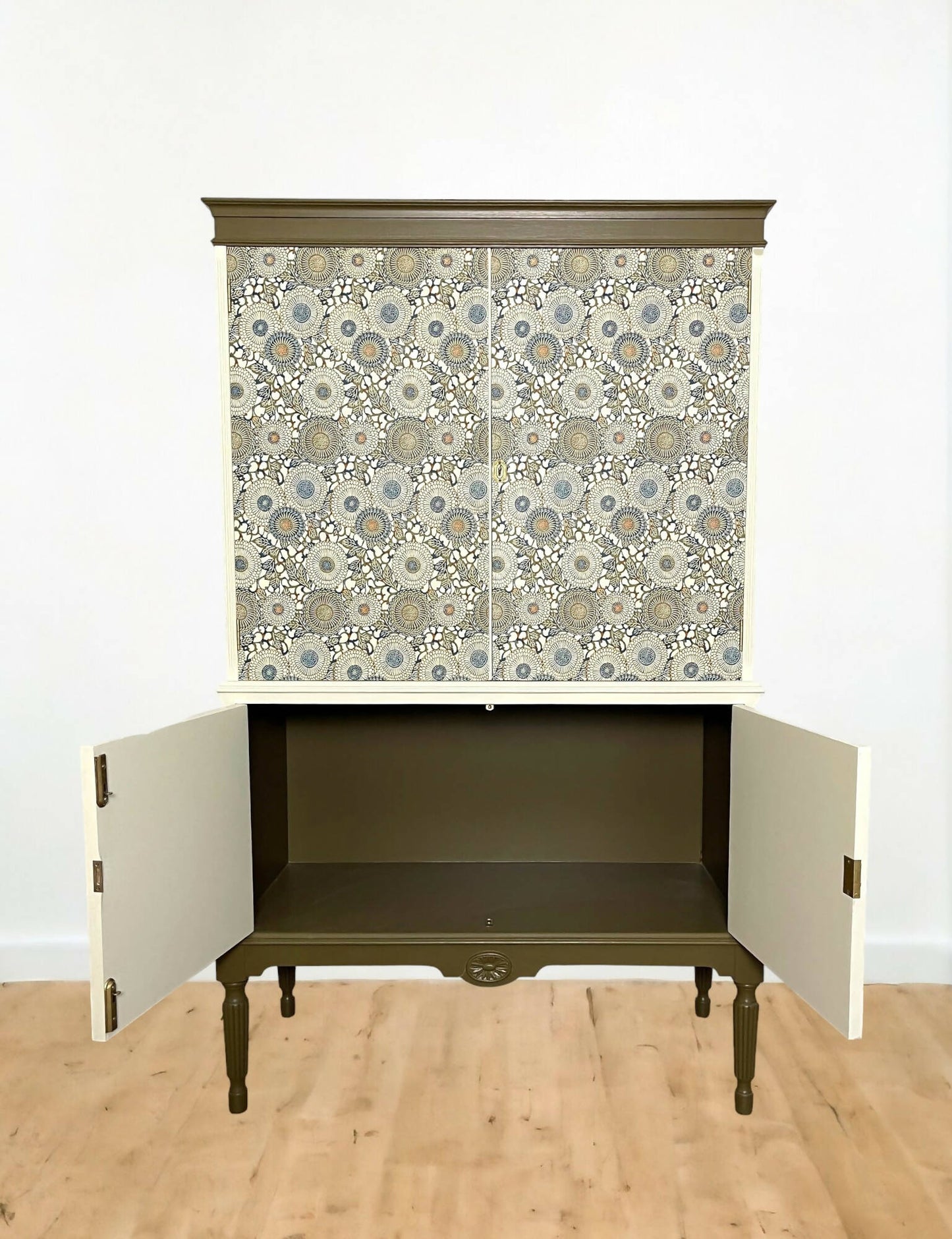 Unique drinks cabinet painted in green and cream