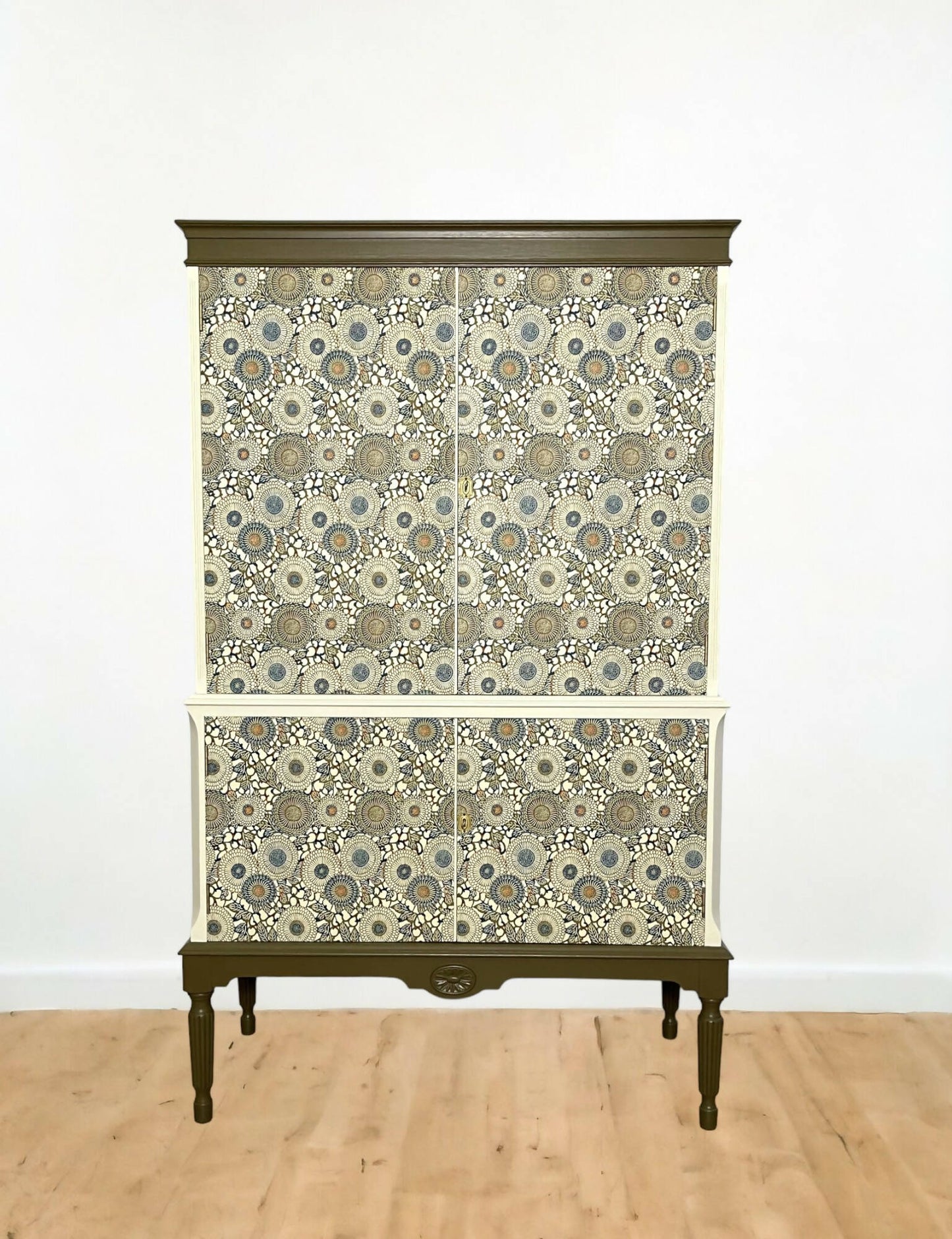 Unique drinks cabinet painted in green and cream