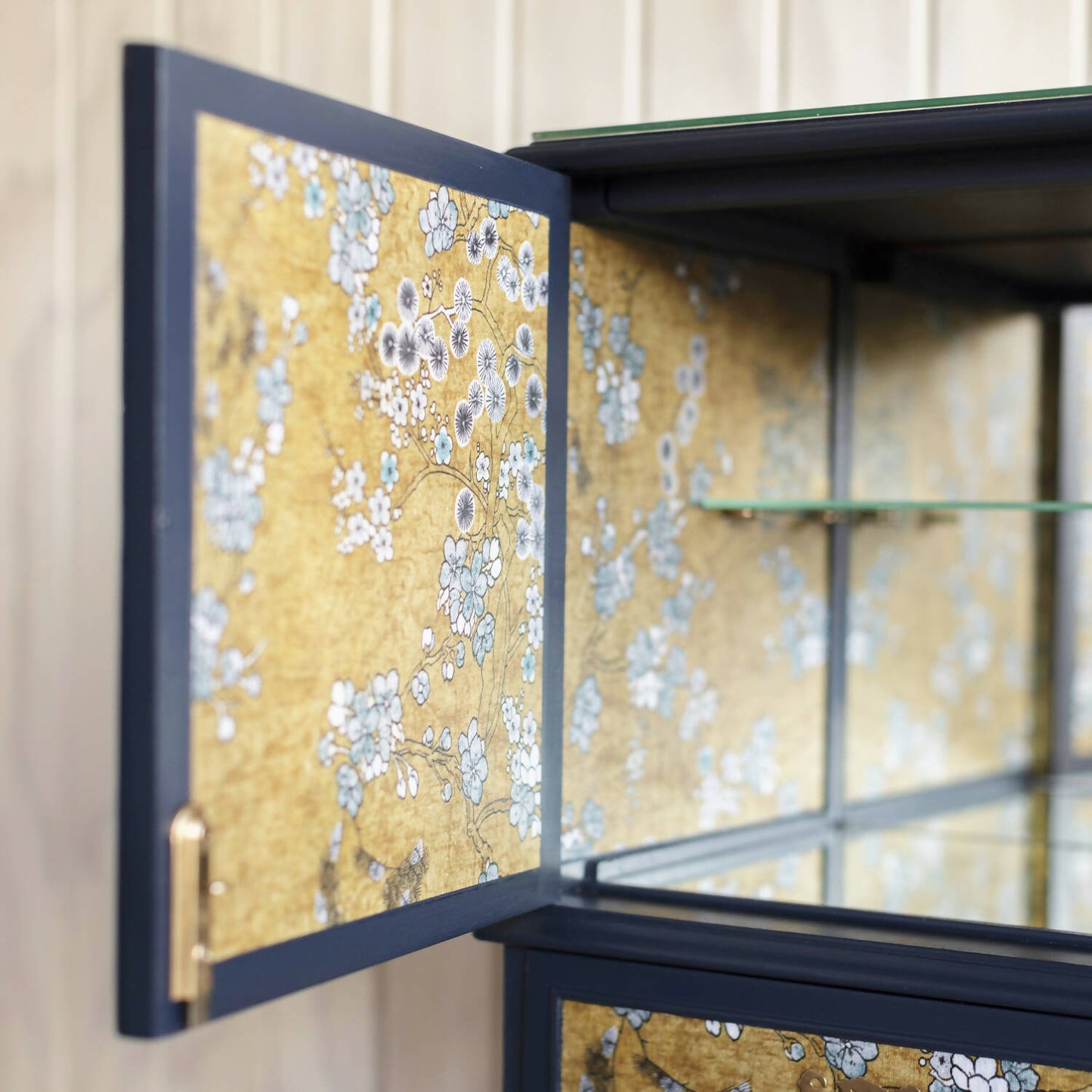 Exceptional vintage cocktail cabinet in midnight blue, boasting an oriental-inspired design. Sold, commission available.