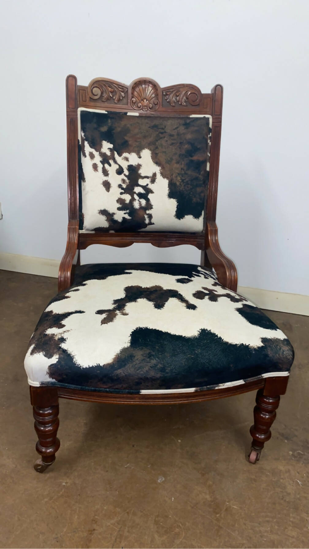 Reupholstered cowhide Victorian chair