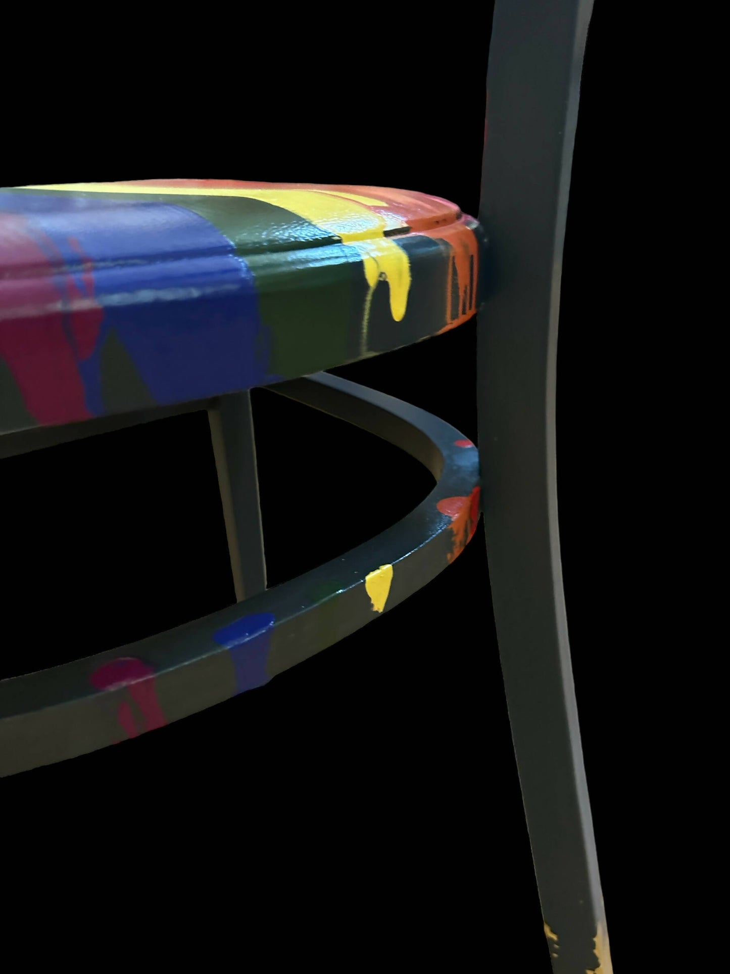 Hand painted school chair with vibrant rainbow stripe seat and gold leaf backrest. Abstract art design.