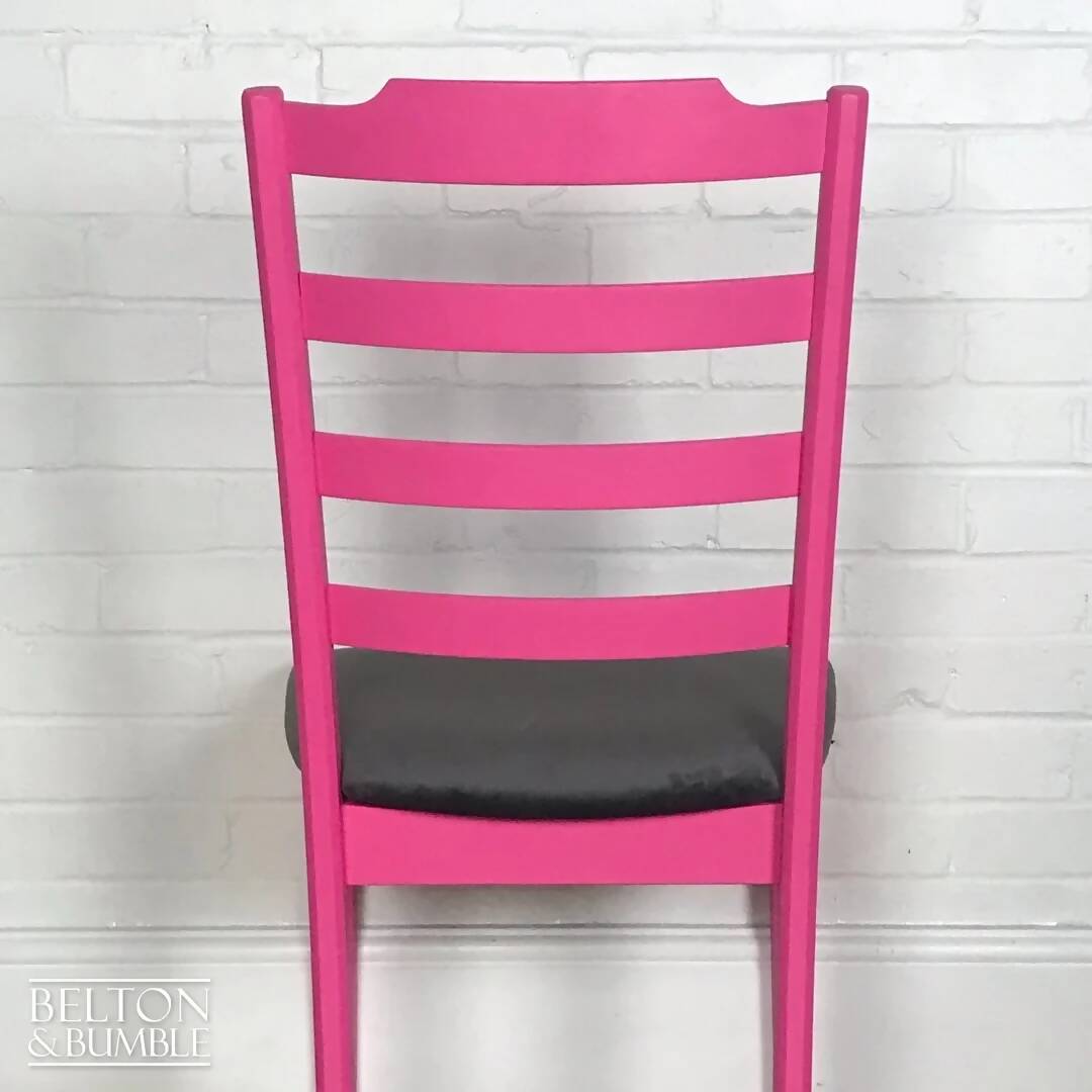 Bright Pink Single G Plan Chair with Grey Velvet Seat.