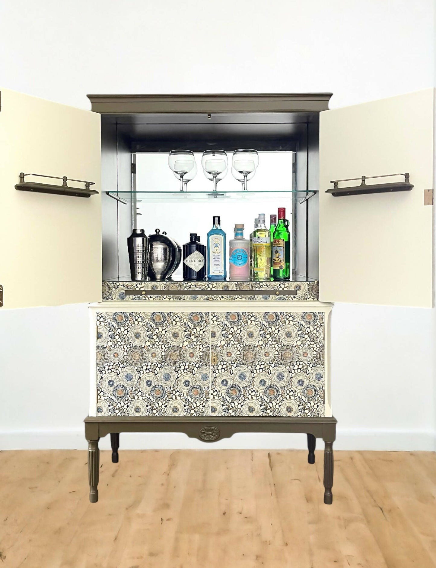 Unique drinks cabinet painted in green and cream
