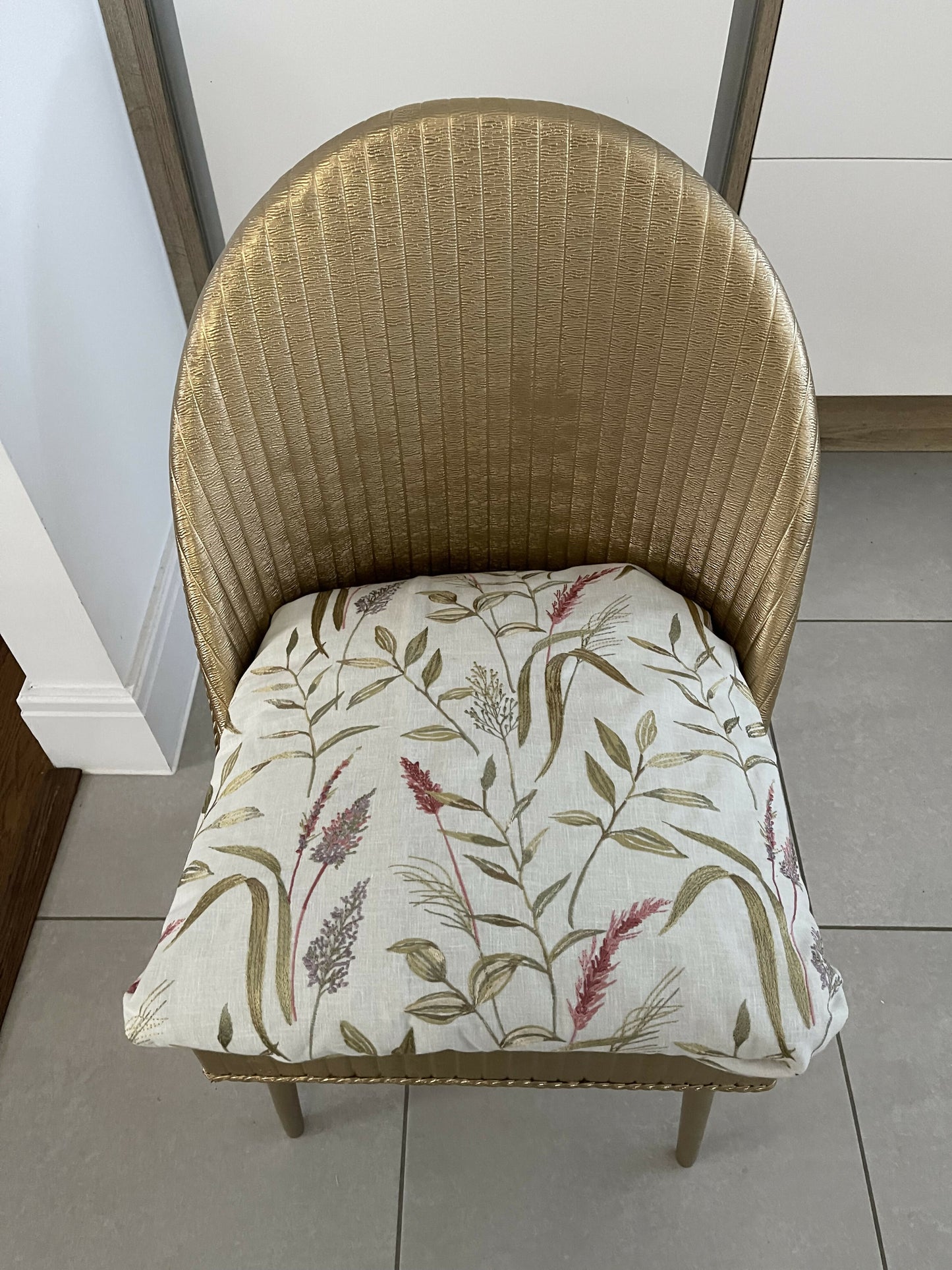 Accent chair. Gold painted wipe clean plastic with your choice of fabric seat. Removable with small storage space beneath.