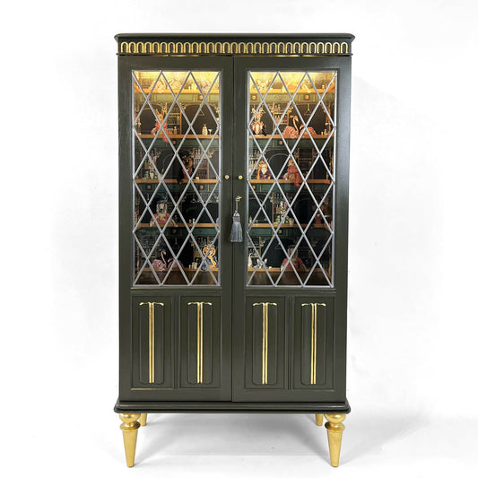Painted green antique drinks cabinet with gold guilded  legs ans carvings