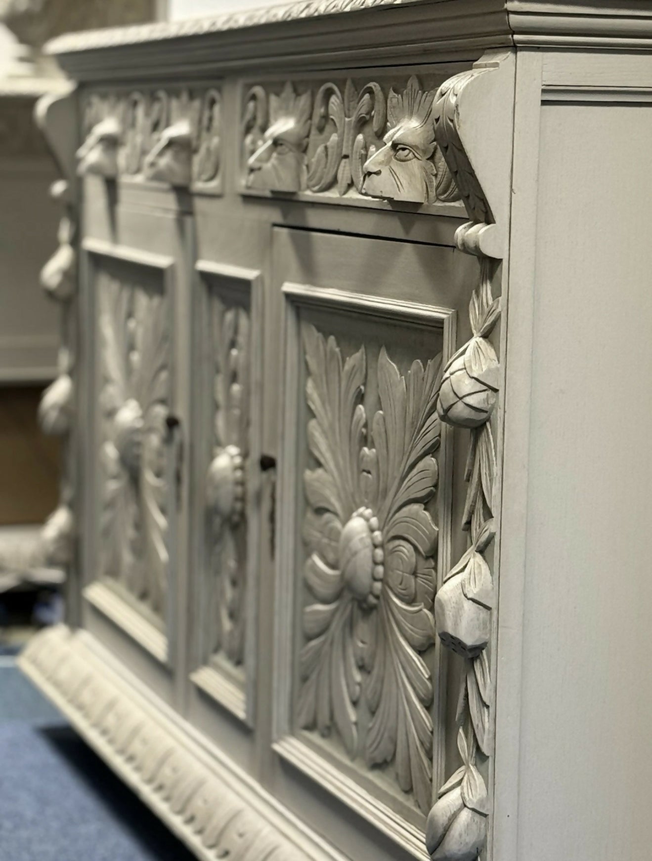 Victorian Dresser with ornate green man carvings.