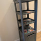 Dark green tall shelves and storage
