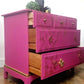 Stag chest of drawers in hot pink and gold