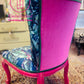 Bold statement accent chair. Pinks,blues and golds