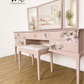 Dusky blush pink Stag Minstrel dressing table set with blossom and butterfly design.