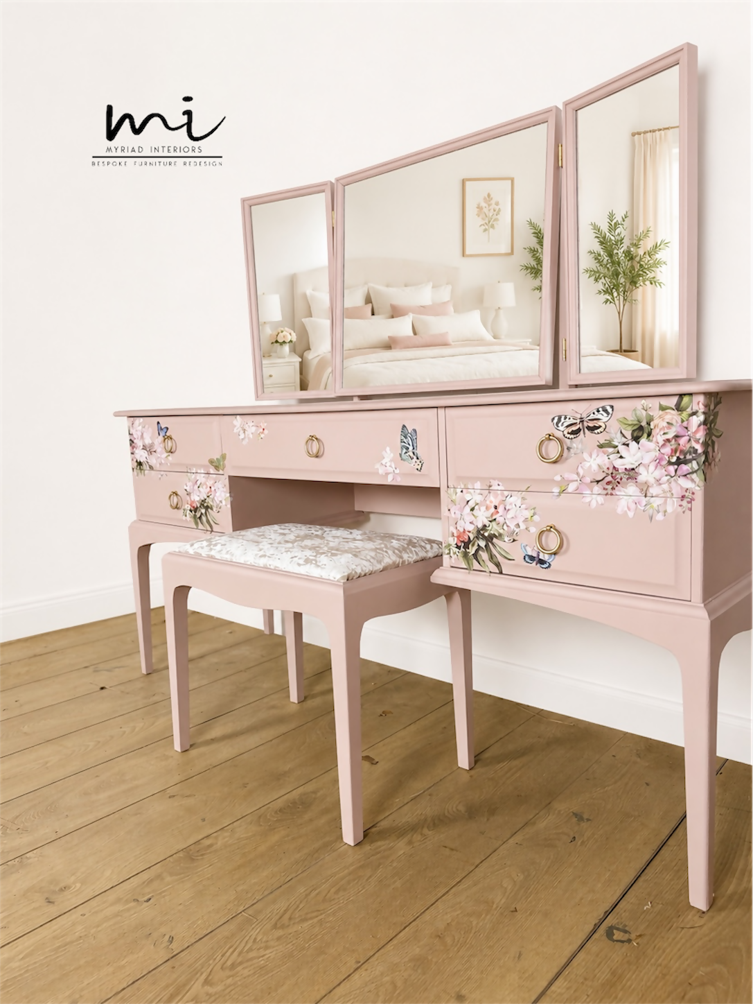 Dusky blush pink Stag Minstrel dressing table set with blossom and butterfly design.