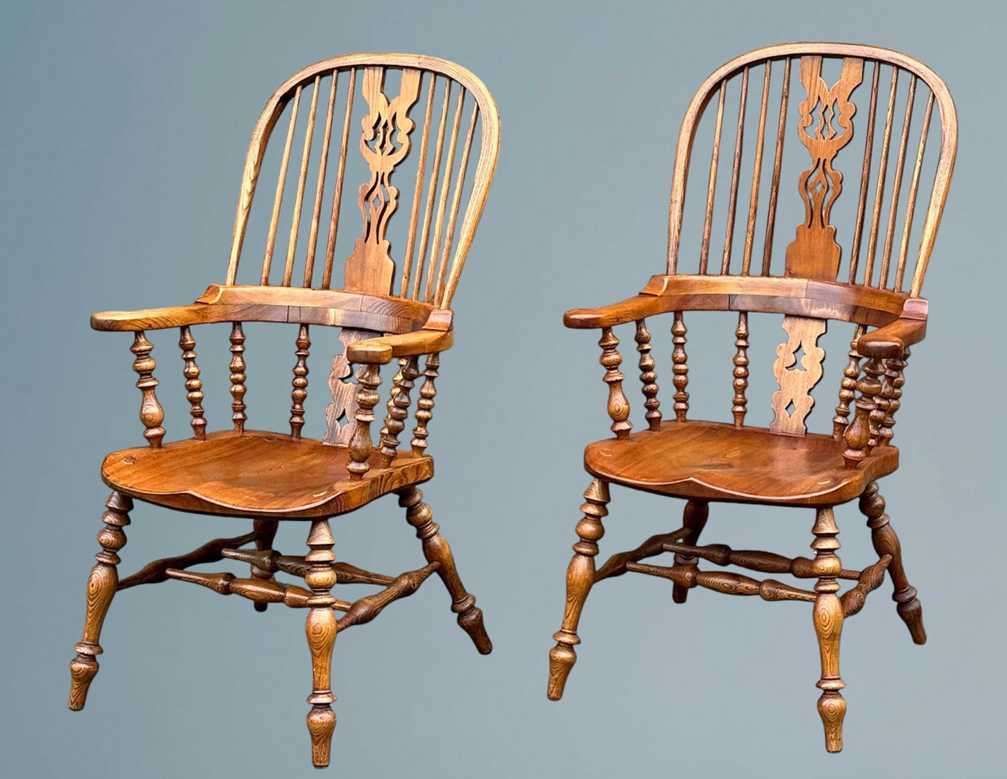 A Large Pair of Ash Broad Arm Windsor Chairs