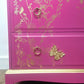Stag chest of drawers in hot pink and gold