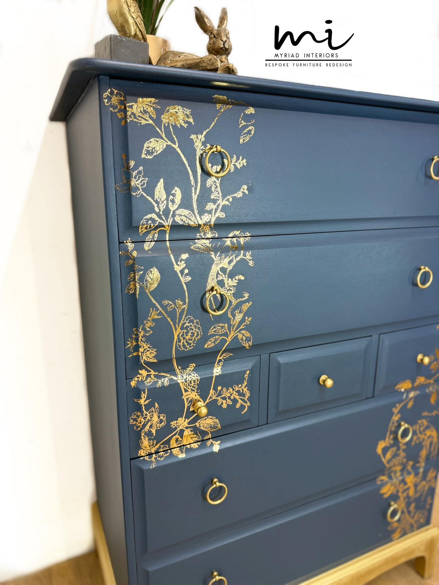 Refinished Stag Minstrel Tallboy Chest Of Drawers In Navy Blue With Gold Foil Floral Bird Design
