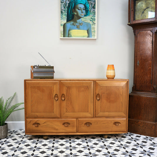 Ercol Windsor Elm Sideboard Model 468 on Castors Light Finish 1960s