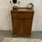 Vintage Art Deco burr walnut veneer cupboard featuring two doors and one drawer.