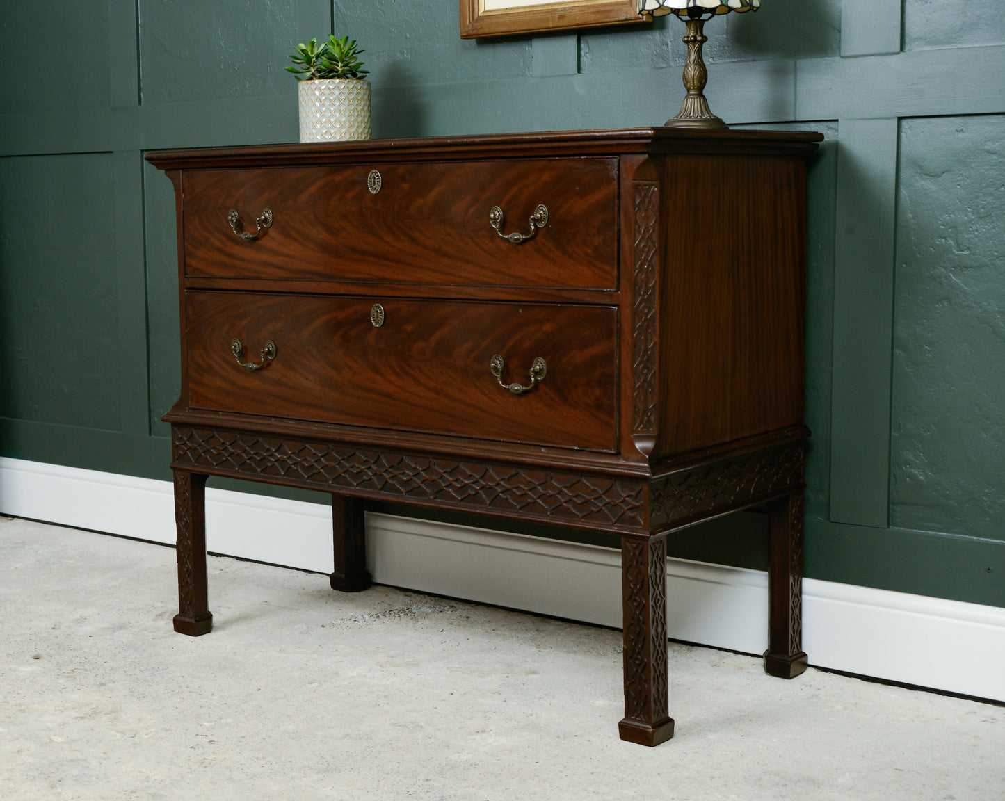 Mahogany Chest of Drawers on Raised Supports with Fretwork Decoration