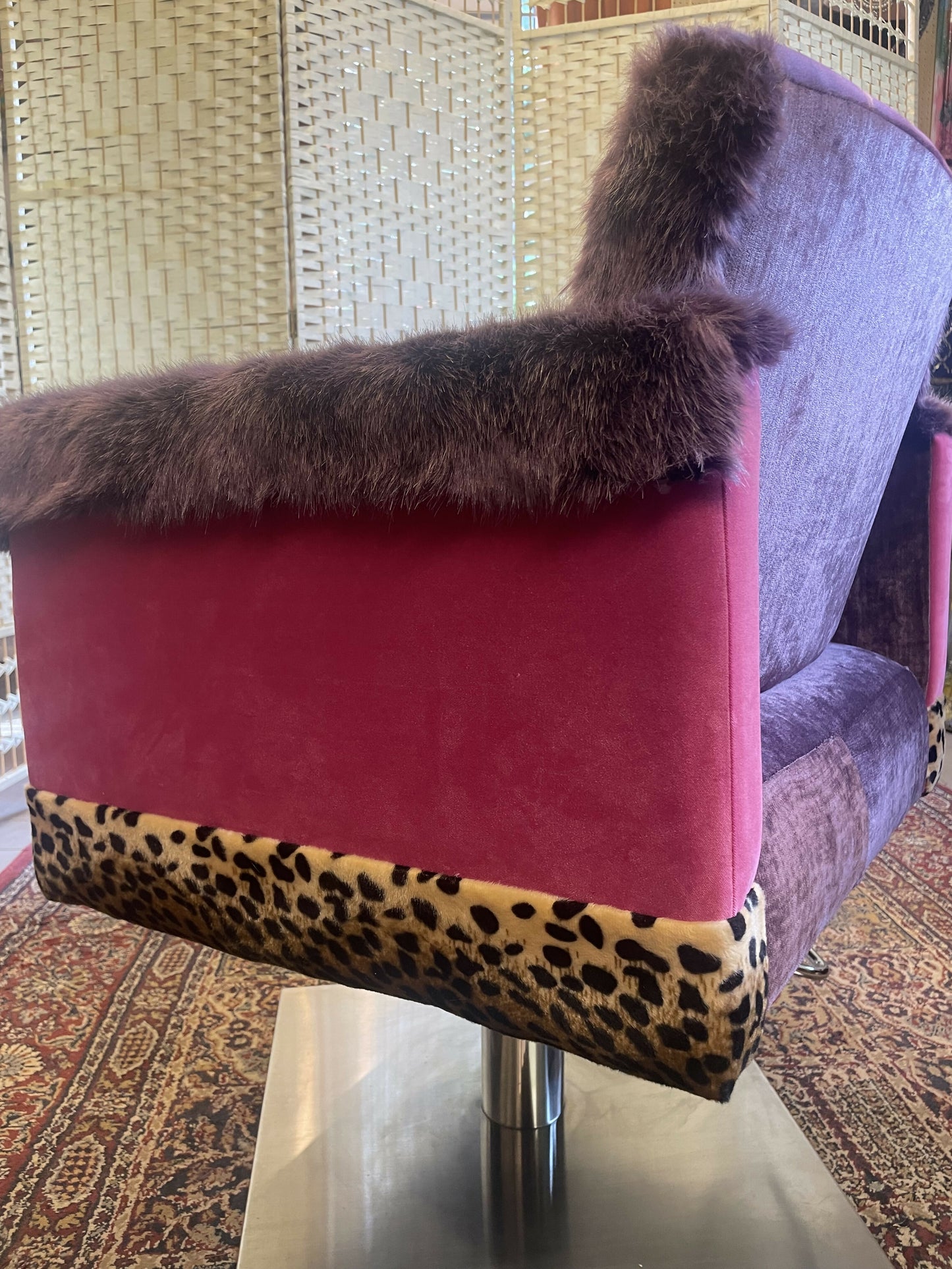 Salon swivel chair. Upholstered to make a funky statement piece. Velvet and faux fur with lion print panel