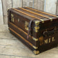 Antique full leather and brass bound travel trunk coffee table