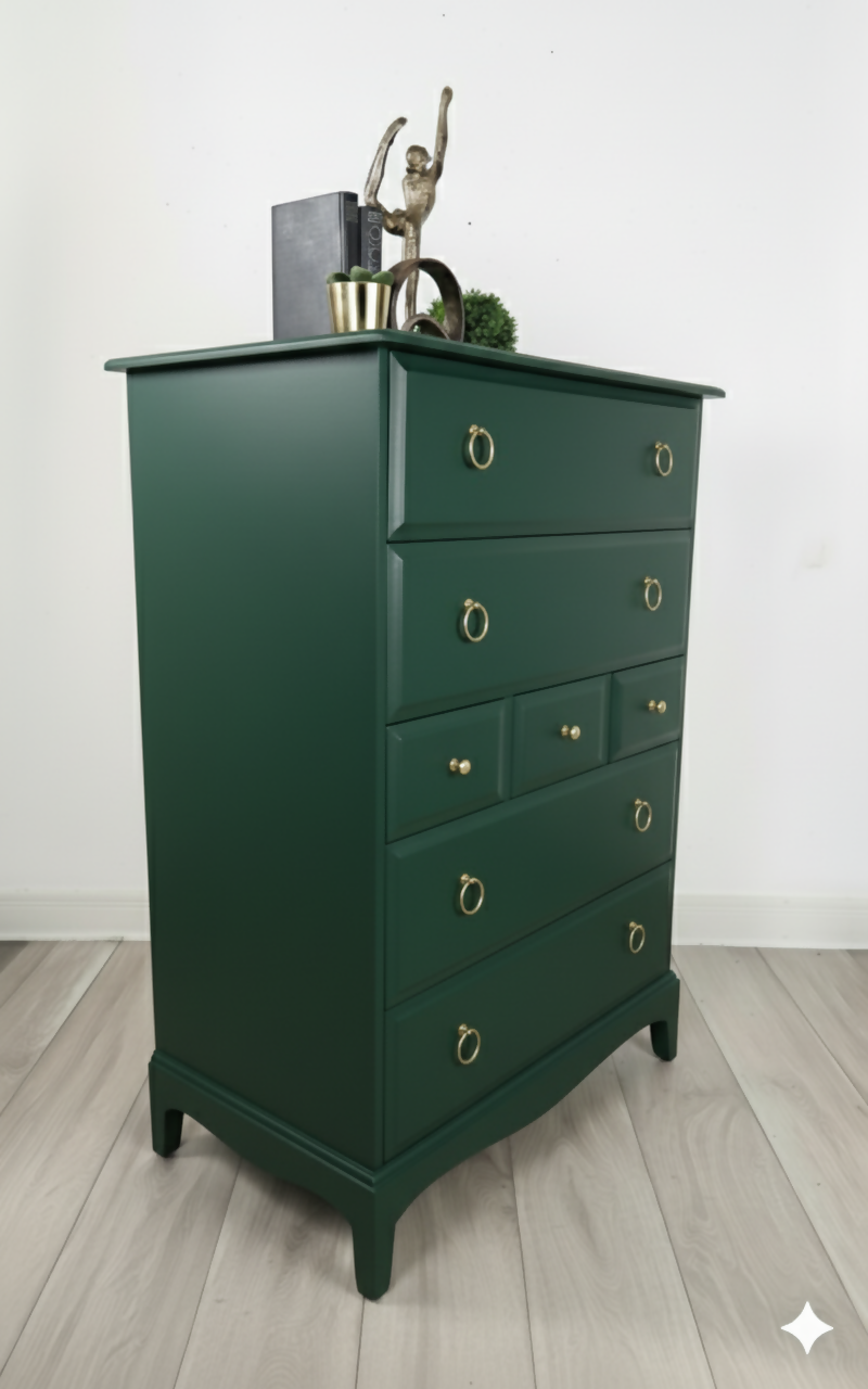 Stag minstrel tallboy chest of drawers in dark green