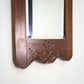 A Pair of Victorian Wall Mirrors Bevel Edged Glass Carved Top and Bottom