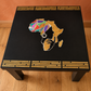 THE AFRICAN ASPECTS UPCYCLED - ONE-OFF FURNITURE ART Black table with stunning African woman/map feature -Giving furniture a second life with soul