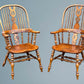 A Large Pair of Ash Broad Arm Windsor Chairs