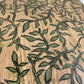 Light grey side table with hand-carved sage motif