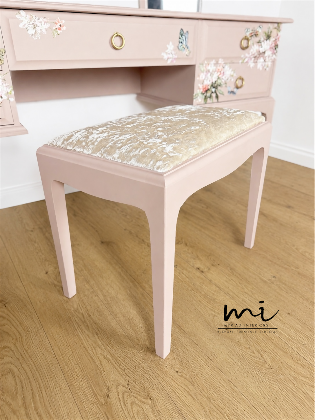 Dusky blush pink Stag Minstrel dressing table set with blossom and butterfly design.