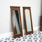 A Pair of Victorian Wall Mirrors Bevel Edged Glass Carved Top and Bottom