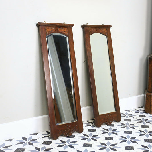 A Pair of Victorian Wall Mirrors Bevel Edged Glass Carved Top and Bottom