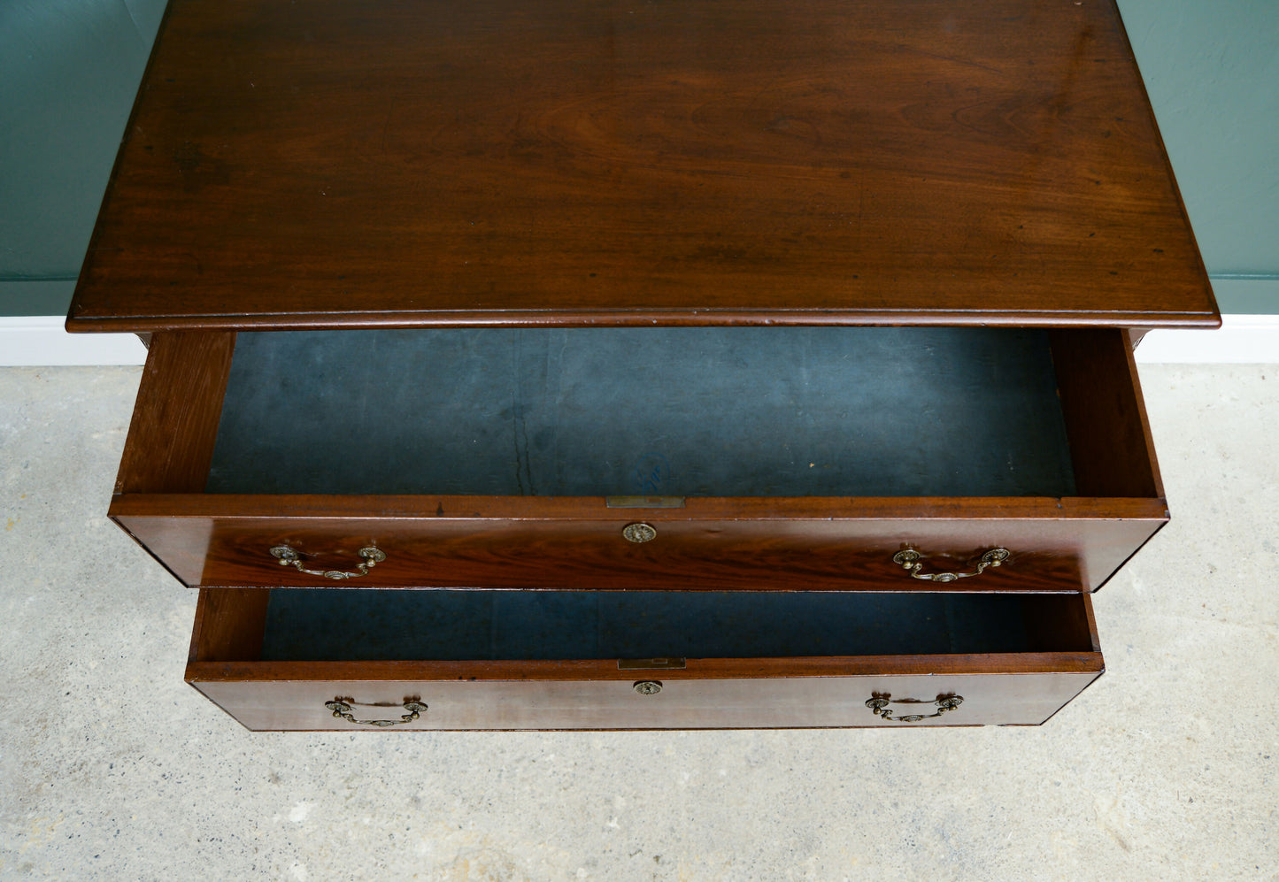 Mahogany Chest of Drawers on Raised Supports with Fretwork Decoration