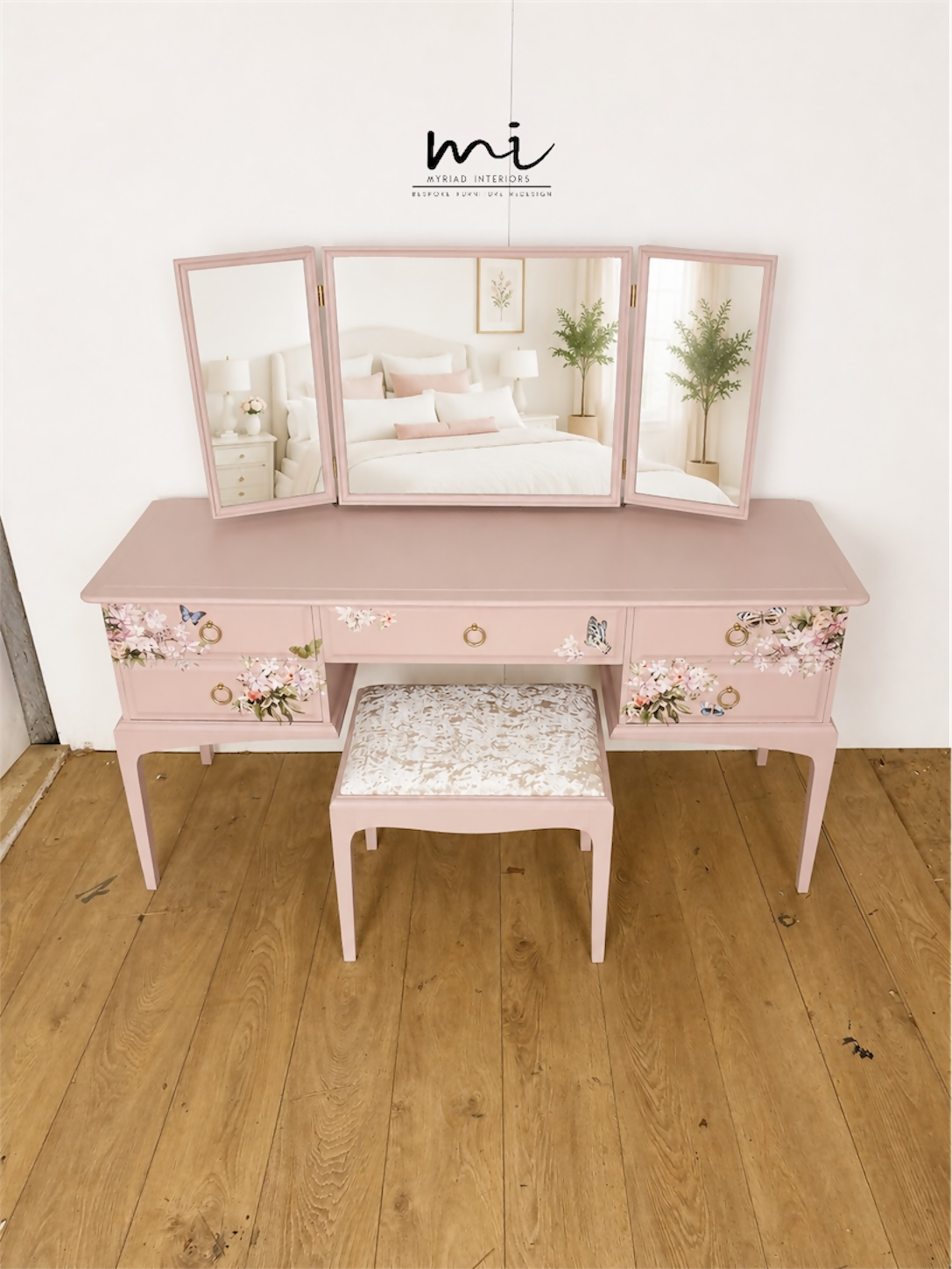 Dusky blush pink Stag Minstrel dressing table set with blossom and butterfly design.