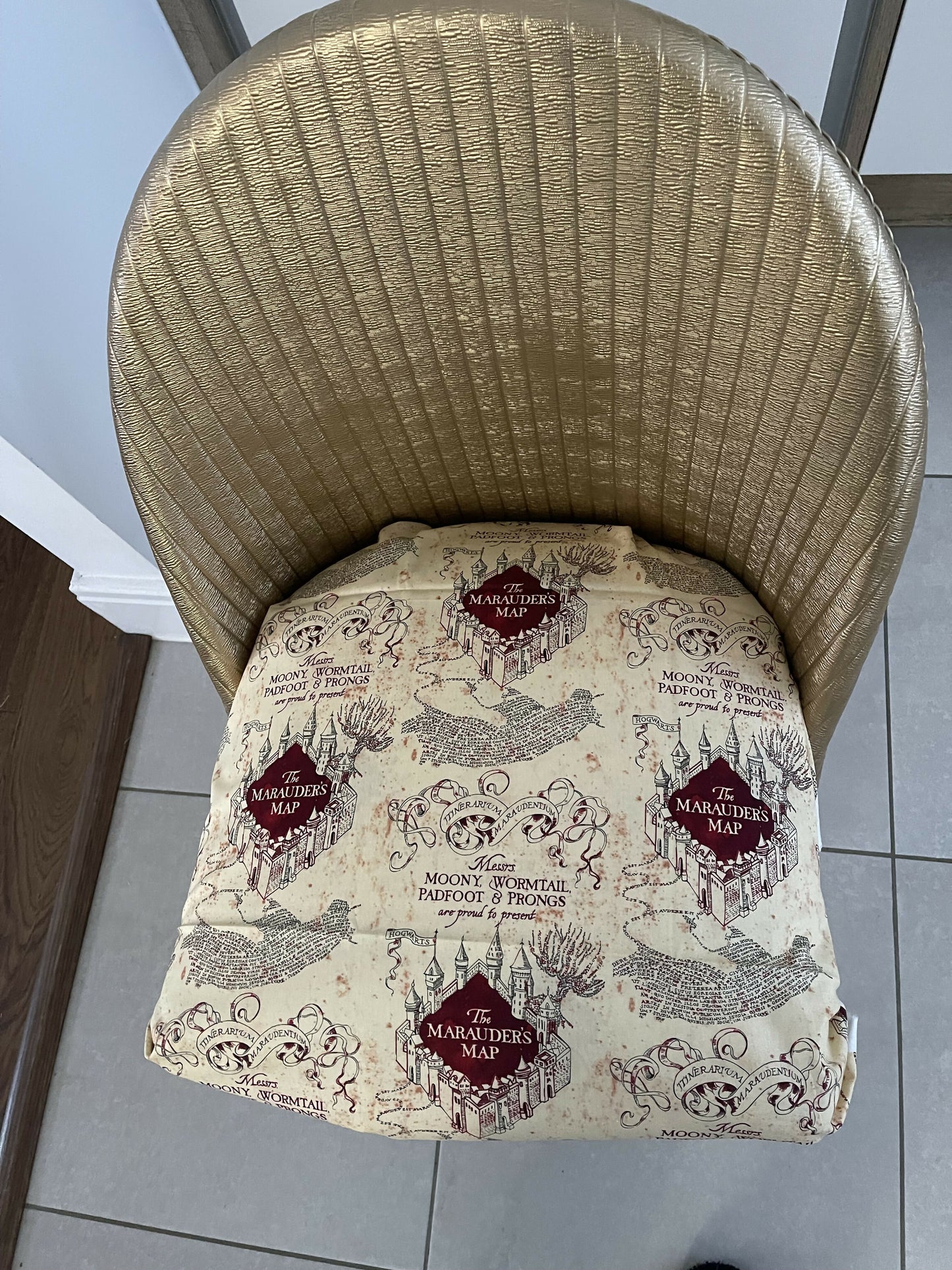 Accent chair. Gold painted wipe clean plastic with your choice of fabric seat. Removable with small storage space beneath.