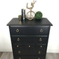 Stag minstrel tallboy chest of drawers