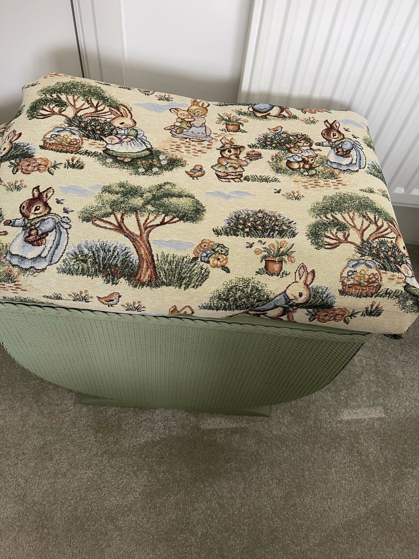 Small mid century Ottoman storage and seat. Sage green paint makes you choose the material.