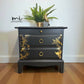 Matt Black Stag Minstrel bedside tables with gold floral and bird design. vintage nightstands. Teatray