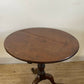 An Antique Oak Tripod Table
