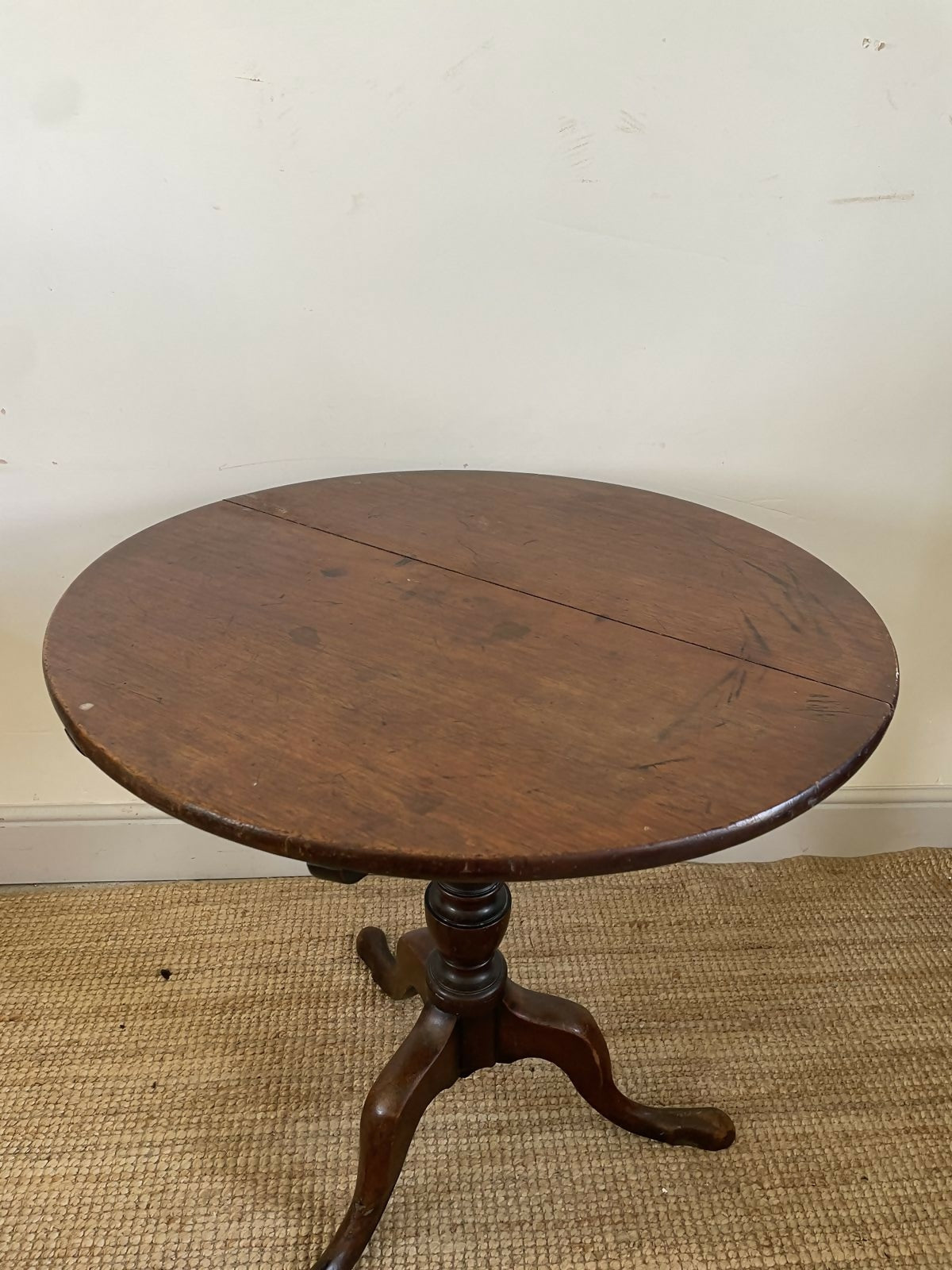An Antique Oak Tripod Table