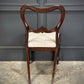 Set of Eight Rosewood Dining Chairs