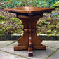 A RUPERT GRIFFITHS MONASTIC CARVED SOLID OAK LAMP TABLE / PLANT STAND