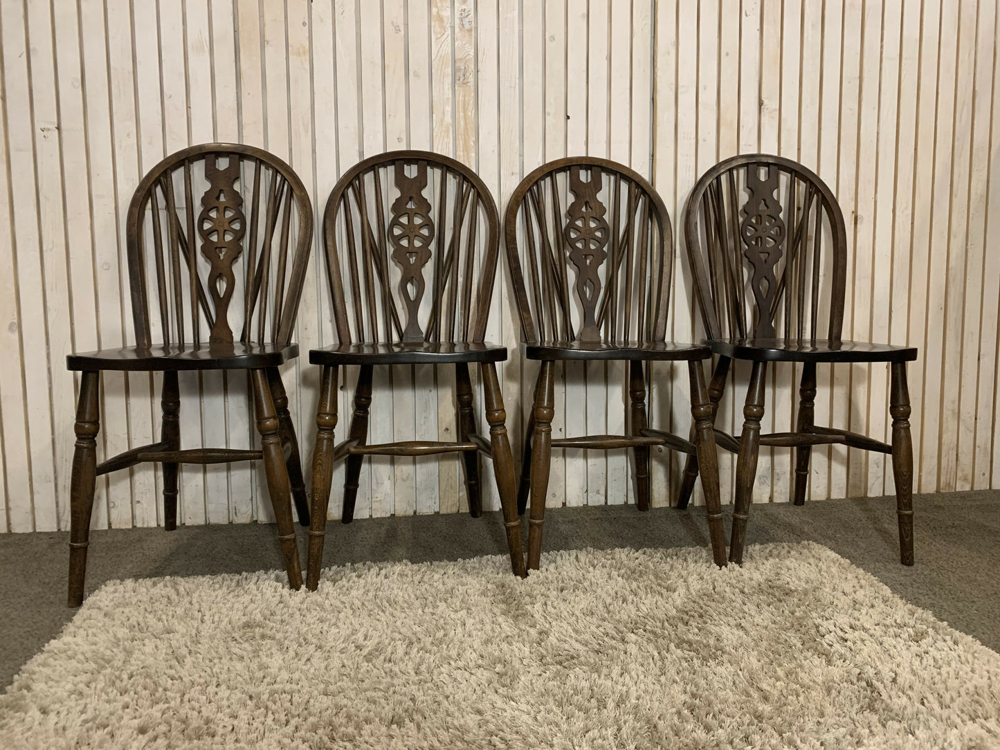 Set of 4 Vintage Wheel Back Dining Chairs – Solid Wood – Carved Backrest