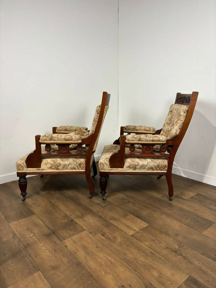 Pair of Victorian Carved Walnut Upholstered Library Armchairs