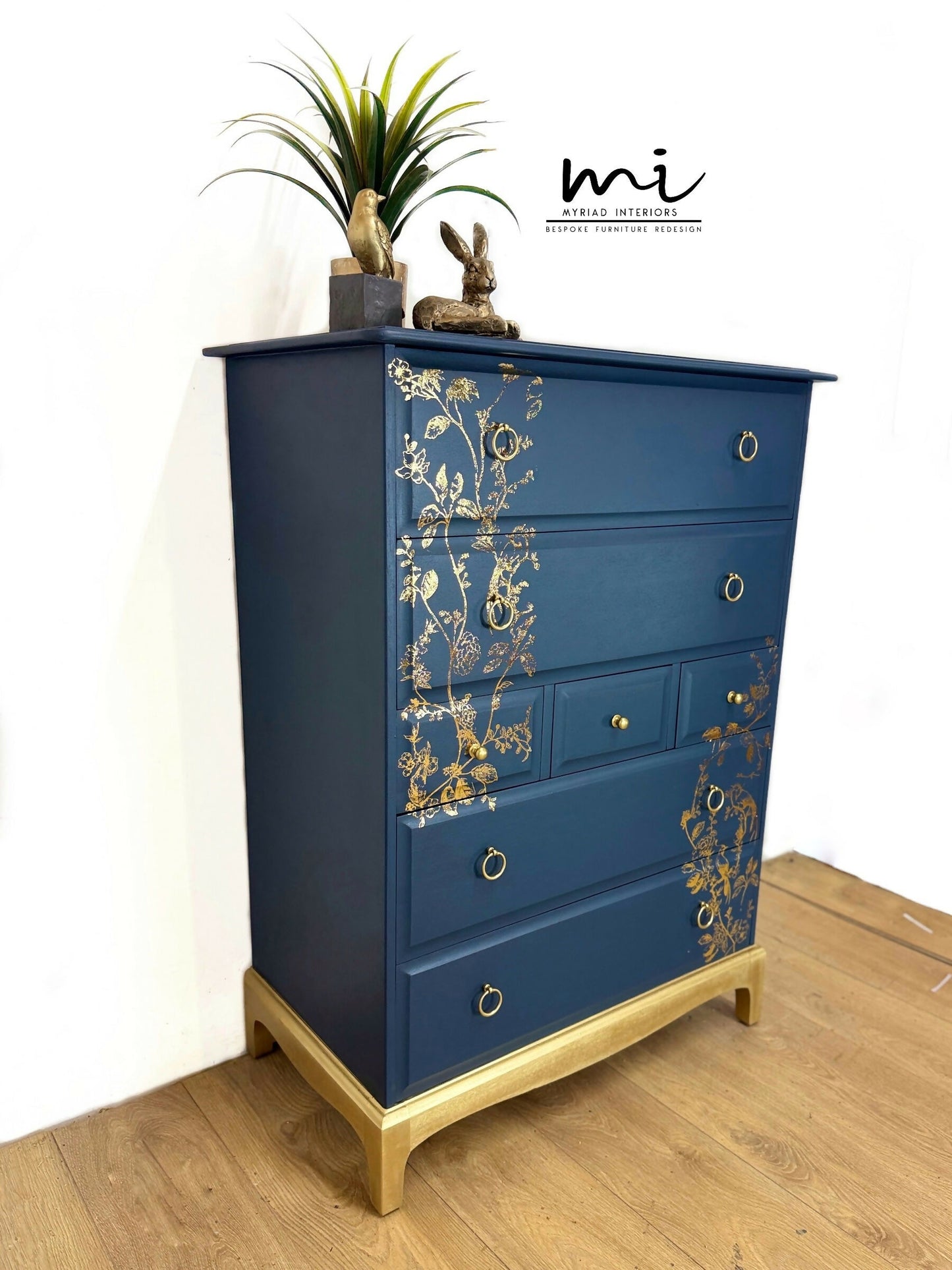 Refinished Stag Minstrel Tallboy Chest Of Drawers In Navy Blue With Gold Foil Floral Bird Design