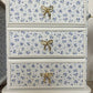 Pair of pine bedside drawers featuring floral decoupage